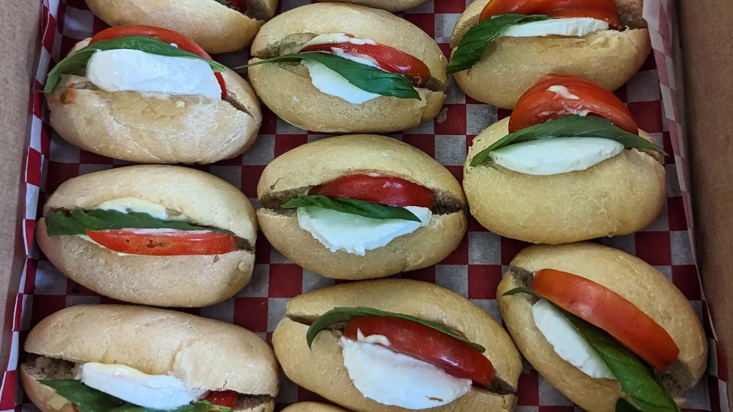 Catering package of Caprese sandwiches